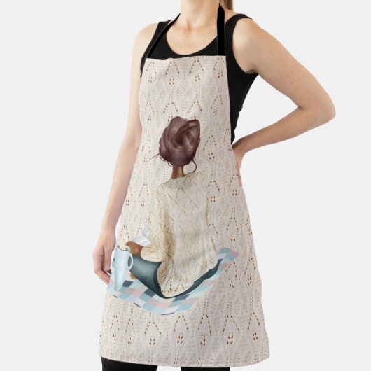 FRAU SITZT AUF BLANKET MIT WARTEEM GETRÄNK SCHÜRZE (InSitu)