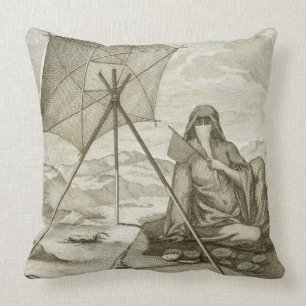 Frau von Dsjidda Flatbread in der Wüste, e machen Kissen