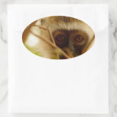 Frecher Affe. Ovaler Aufkleber (Tasche)