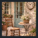 French Country Courtyard Coffee Table  Poster<br><div class="desc">Bring the warmth and romance of the French countryside into your home with this serene courtyard wall art. A rustic stone table set with an open book, fresh coffee, and delicate flowers sits beside a charming wooden chair draped with a soft linen throw. Sunlight glows through vintage French doors adorned...</div>
