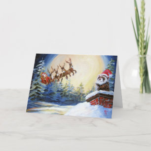 Frettchen und Weihnachtsmann mit Schlitten Feiertagskarte