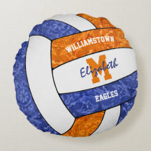 Freundlich-orangefarbene Volleyballmannschaft