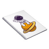 Freundlicher Astronaut, der vom Planeten abwindet Notizblock (Rechte Seite)