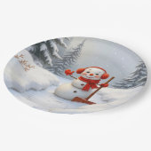 Freundlicher Schneemann mit einer roten Schaufel Pappteller (Schrägansicht)