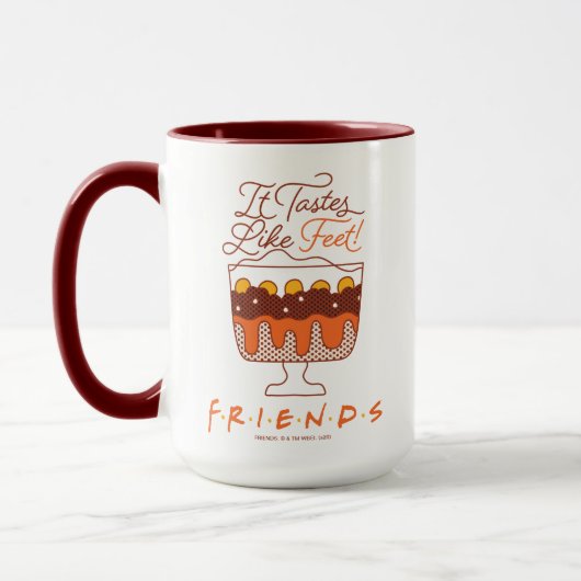FRIENDS™ | Es schmeckt nach Feet! Tasse (Links)