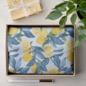 Frisch gelber Zitronenbaum auf blauem Hintergrund Seidenpapier (Geschenk)