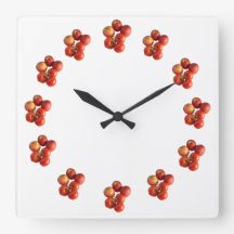 Frischäpfel- und Tomaten-Wanduhr