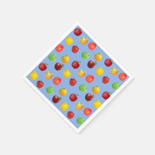 Frische farbenfrohe Äpfel auf Sky Blue Serviette (Ecke)