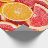 Frische reife Orange- und Grapefruituntergrund Geschenkpapier (Ecke)