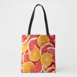 Frische reife Orange- und Grapefruituntergrund Tasche