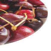 Frische rote Kirschen in einer Schüssel Fotografie Schneidebrett (Ecke)