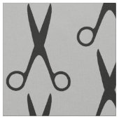 Friseursalon schwarze Schere graues Muster Stoff (Nahaufnahme)