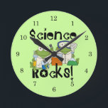 Frogs Science Rocks Runde Wanduhr<br><div class="desc">Two frogs with lab coats and safety goggles doing lab experiments on Science Rocks T-shirts,  hoodies,  buttons,  cards,  mugs,  magnets,  keychains,  journals,  mousepads,  and other Science Rocks apparel and gifts that are sure to get a few laughs and second looks!</div>