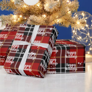 Frohe Feiertage Text in Schneeflocken auf Karo Geschenkpapier