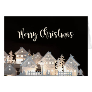 Frohe Weihnacht-belichtete Weihnachtshäuser