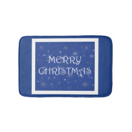 Frohe Weihnachten auf Blau mit Schneeflocken Badematte