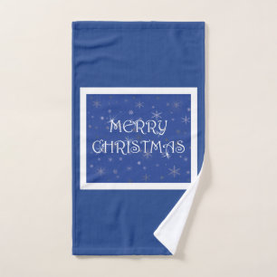 Frohe Weihnachten auf Blau mit Schneeflocken Handtuch