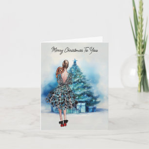 Frohe Weihnachten Frau und blauer Weihnachtsbaum Karte