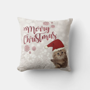 Frohe Weihnachten,Glitzernde Bokeh,Katze mit Weihn Kissen