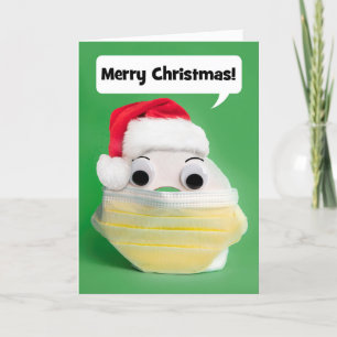 Frohe Weihnachten Klopapier in Covid-Mundschutz