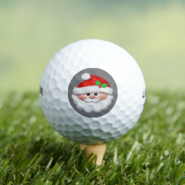 Frohe Weihnachten mit dem Gesicht des Weihnachtsma Golfball