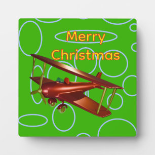 Frohe Weihnachten Rotes Doppeldeckerflugzeug auf g Fotoplatte