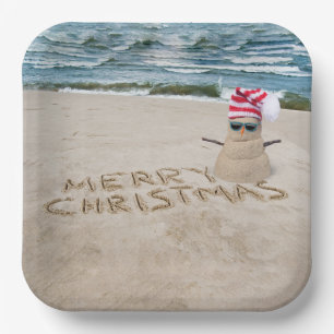 Frohe Weihnachten Sandman on Beach Pappteller