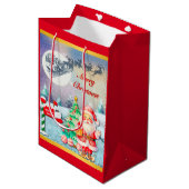 Frohe Weihnachten, Schlitten, Rentier, Schneeflock Mittlere Geschenktüte (Vorderseite Schrägansicht)