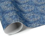 Frohe Weihnachten Text auf blauem Geschenkpapier (Rolleneckpunkt)