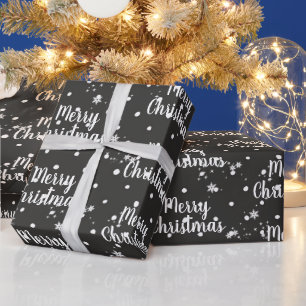 Frohe Weihnachten Text in Schneeflocken auf roter Geschenkpapier