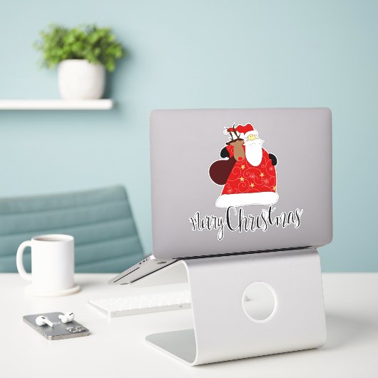 Frohe Weihnachten vom Weihnachtsmann Aufkleber (Laptop auf Schreibtisch)