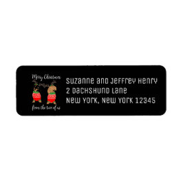 Frohe Weihnachten zwei gedeckte Dackeln Urlaub