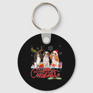 Frohe Weihnachts Cavalier King Santa Reindeer Ligh Schlüsselanhänger
