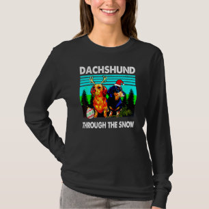 Frohe Weihnachts-Dackel Hund durch den Schnee T-Shirt