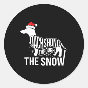Frohe Weihnachts-Dackel Hund durch den Schneekanal Runder Aufkleber