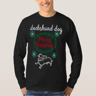 Frohe Weihnachts-Dackel Hund durch den Sn T-Shirt