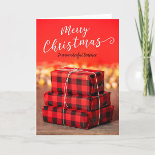 Frohe Weihnachts-Lehrer-Stapel der Geschenke auf R Feiertagskarte