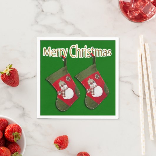 Frohe Weihnachts-Schneemann auf Strumpf über Grün Serviette (Beispiel)