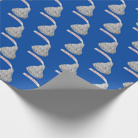 Frohe Weihnachtskandy auf Blue Geschenkpapier (Ecke)