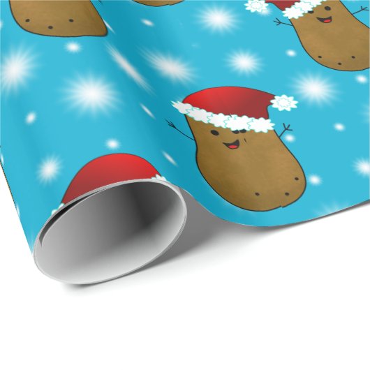 Frohe Weihnachtskartoffeln mit Weihnachtsmannmütze Geschenkpapier (Rolleneckpunkt)