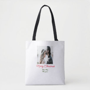Frohe Weihnachtspaar Foto geben Namen glücklichen Tasche