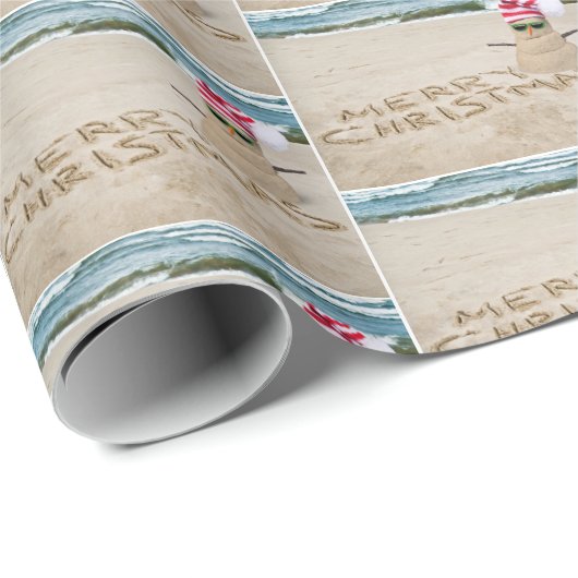 Frohe Weihnachtssandman am Strand Geschenkpapier (Rolleneckpunkt)