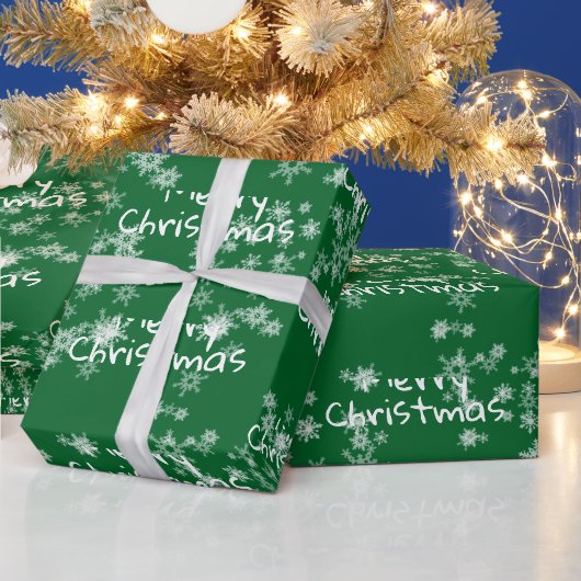 Frohe Weihnachtstext in Schneeflocken Geschenkpapier (Feiertage)