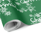 Frohe Weihnachtstext in Schneeflocken Geschenkpapier (Rolleneckpunkt)