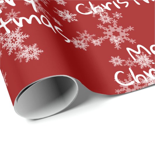 Frohe Weihnachtstext in Schneeflocken Geschenkpapier (Rolleneckpunkt)