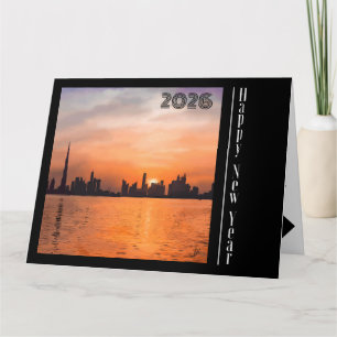 Frohes neues Jahr - Sonnenuntergang über einer Küs Karte