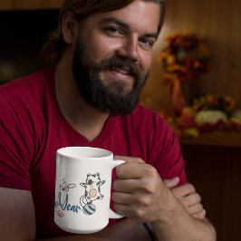 Frohes neues Jahr zwischen Kätzchen auf einem Garn Kaffeetasse