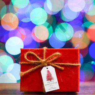 Fröhlich zu Feiertags-Weihnachtsbaum-rotem Geschenkanhänger