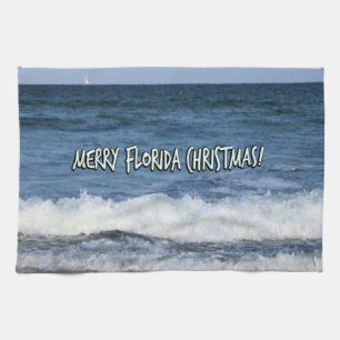 Fröhliche Florida-Weihnachten über dem blauen Ozea Geschirrtuch