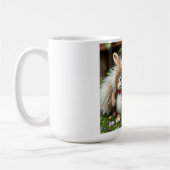 „Fröhliche Hasenfreunde im Frühlingsgarten“ Kaffeetasse (Links)